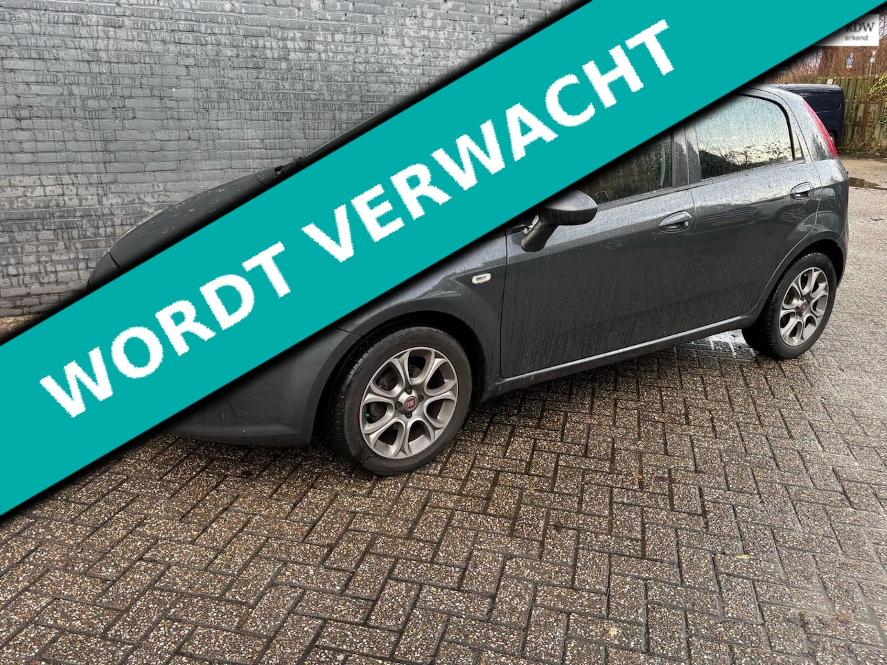Fiat Punto Evo - 0.9 TwinAir Lounge 5-drs 2e eig. 112.000km Clima Cruise Navi - AutoWereld.nl
