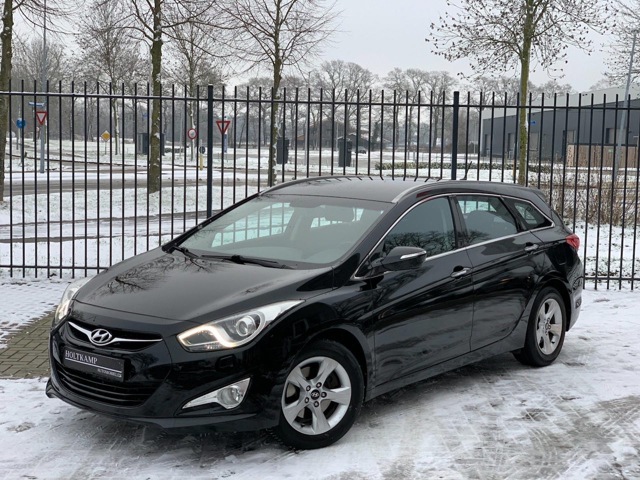 Hyundai i40 Wagon - 1.6 GDI Blue i-Vision | CRUISE | NAVI | CAMERA | KEYLESS - AutoWereld.nl