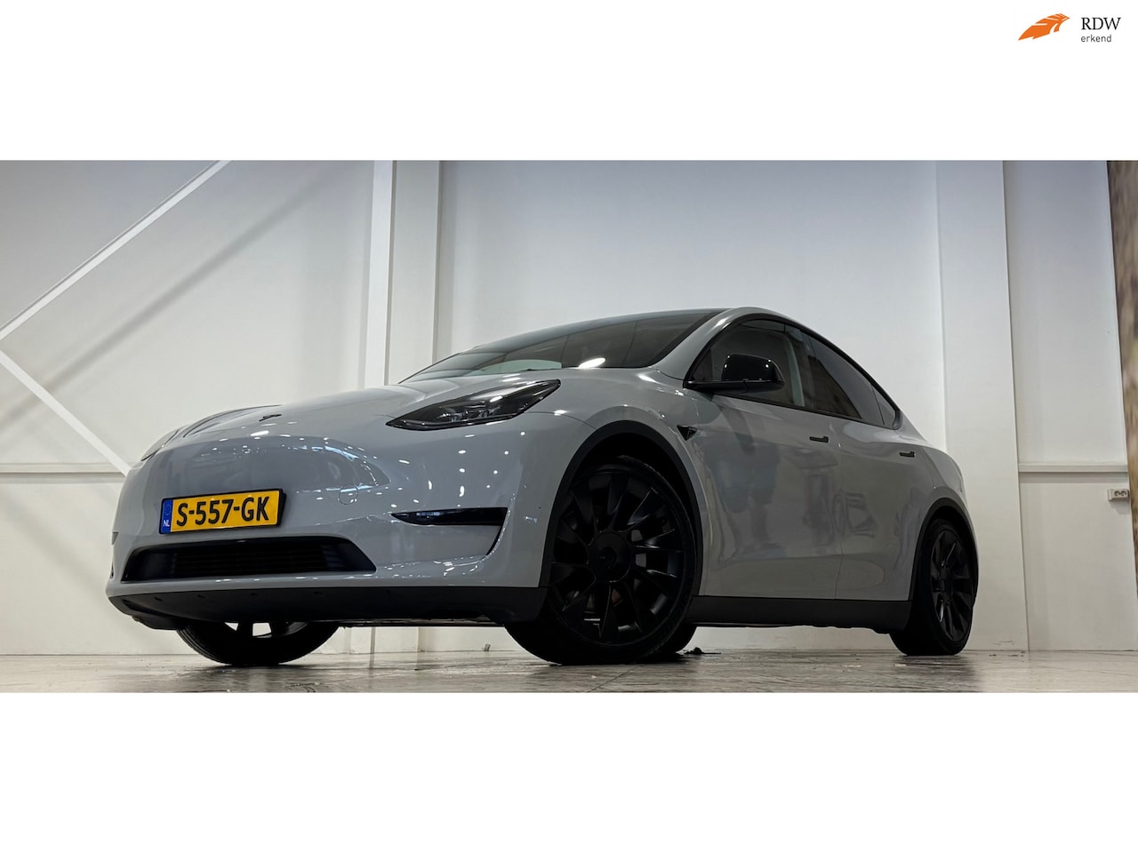 Tesla Model Y - RWD 58 kWh 1e Eigenaar Pastel wrap Mooi! - AutoWereld.nl