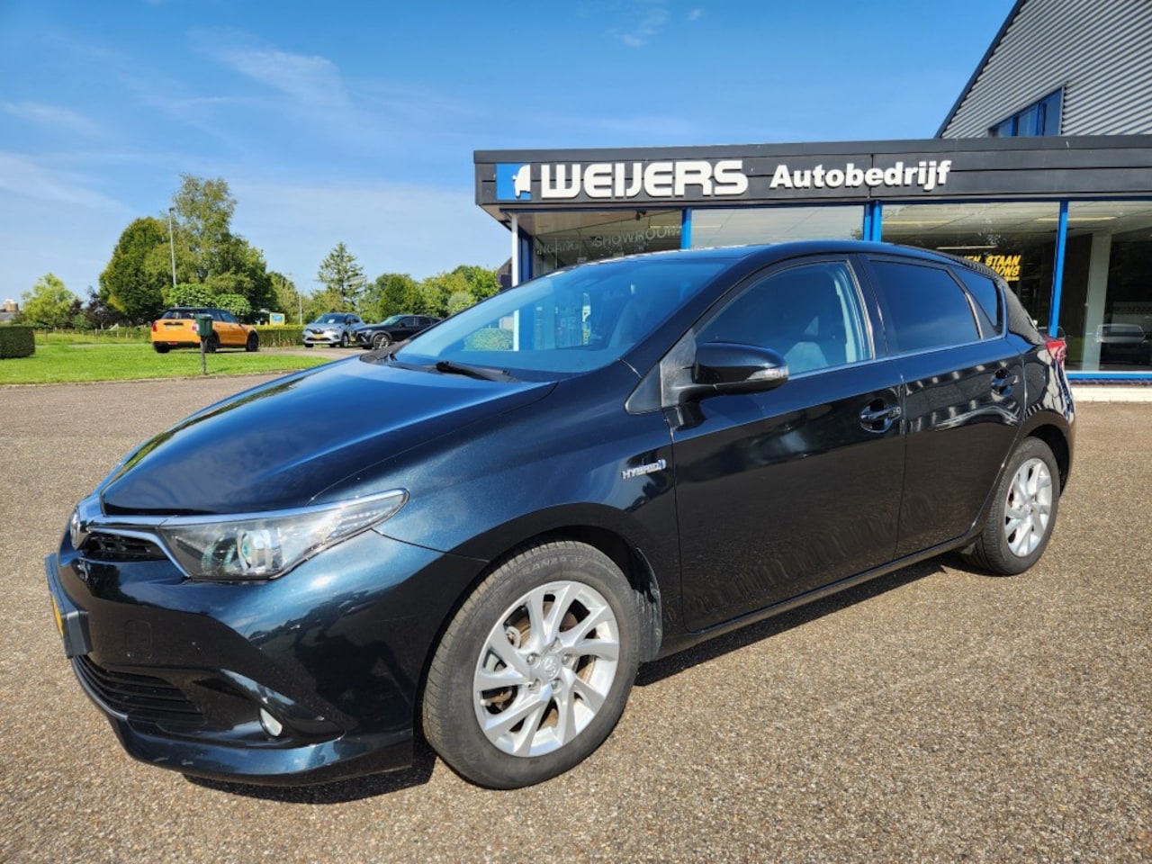 Toyota Auris - 1.8 HYBRID DYNAMIC Trekhaak, Android Auto/Apple Carplay, LM, Navigatie - AutoWereld.nl
