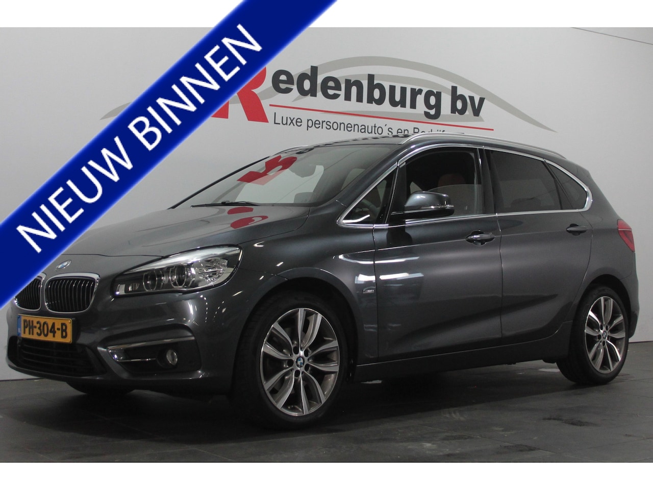 BMW 2-serie Active Tourer - 220i High Executive - Camera / Navi / Stoelverw. - AutoWereld.nl