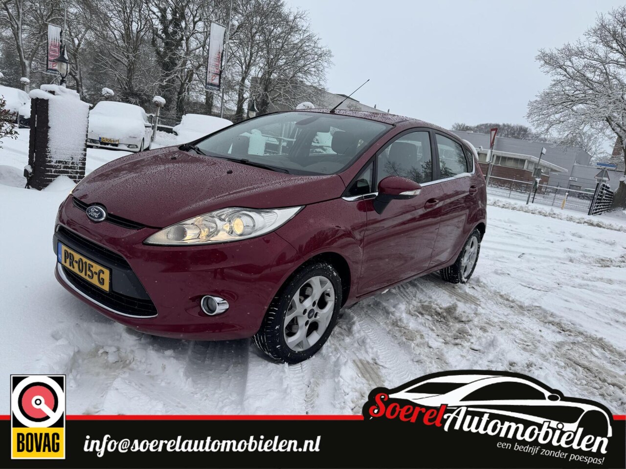 Ford Fiesta - 1.25 Ghia 5deurd airco trekhaak lm velgen boekjes - AutoWereld.nl