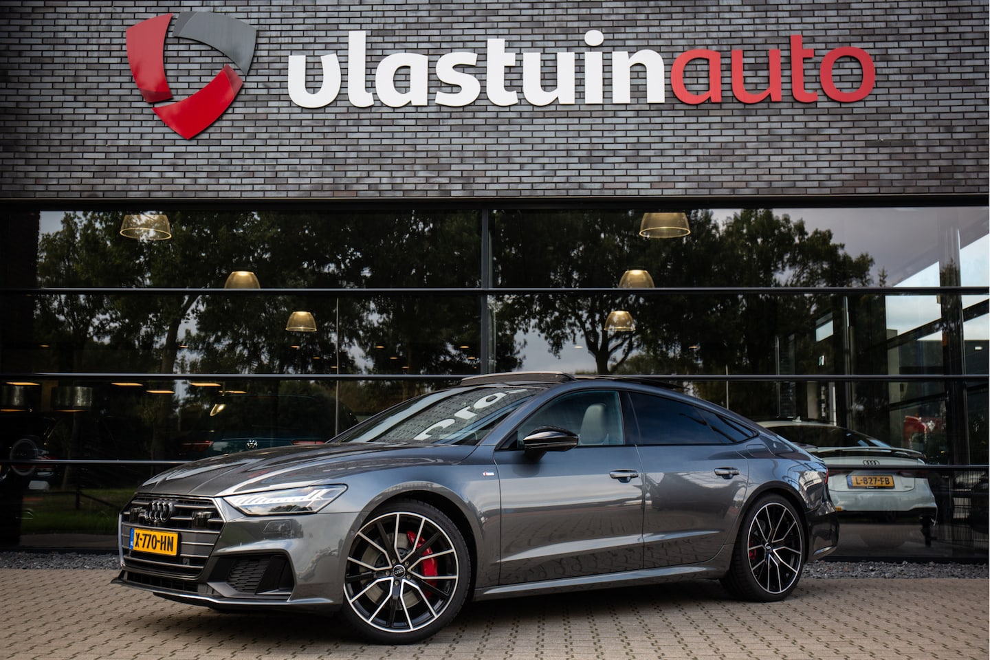 Audi A7 Sportback - 55 TFSI e quattro Competition | Panoramadak, Head-up Display, S7 Diffuser, RS-Zetels - AutoWereld.nl