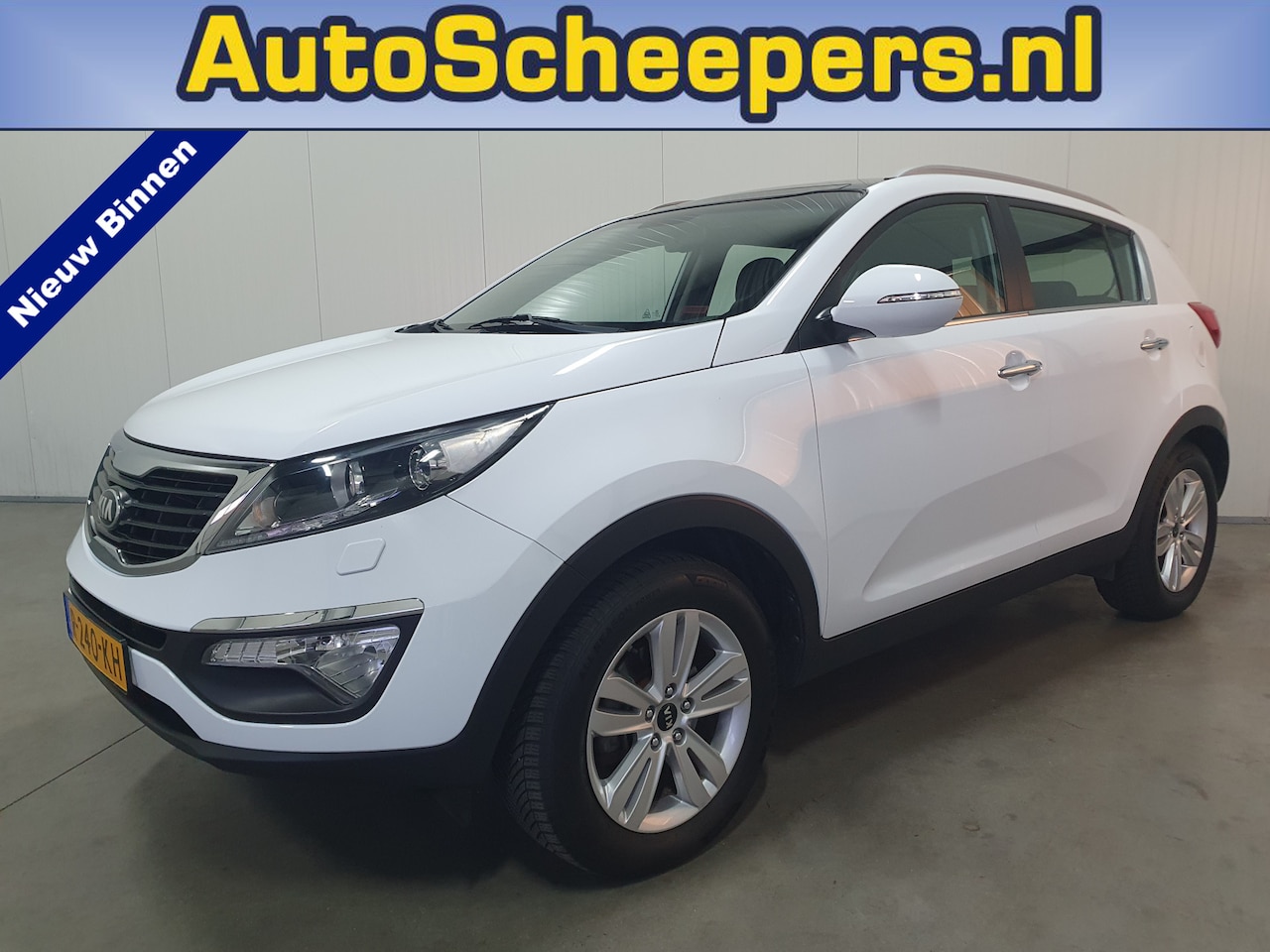 Kia Sportage - 2.0 Plus Pack PANO/NAVI/CRUISE/TRHAAK - AutoWereld.nl