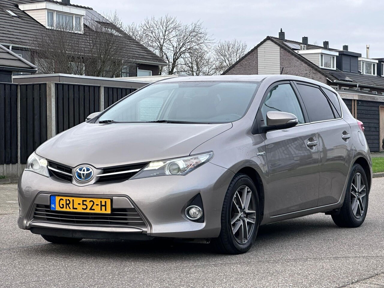 Toyota Auris - 1.8 Hybrid Lease Automaat*Achteruit Camera*Cruise*Clima*LM velgen*Dealer ondergoeden* - AutoWereld.nl