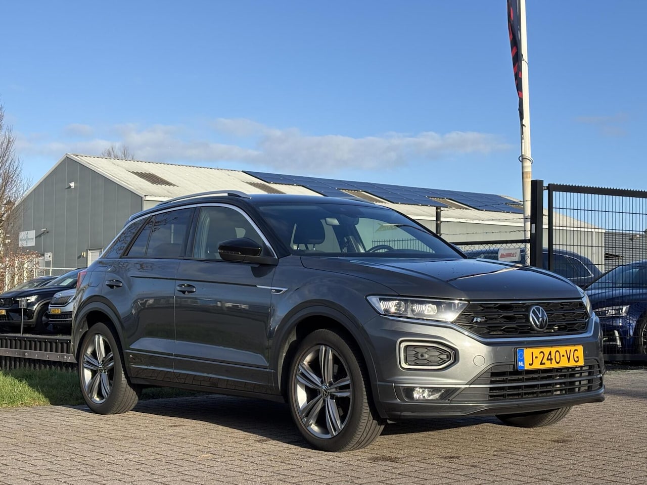 Volkswagen T-Roc - 1.5 TSI Sport Business R trekhaak acc camera - AutoWereld.nl