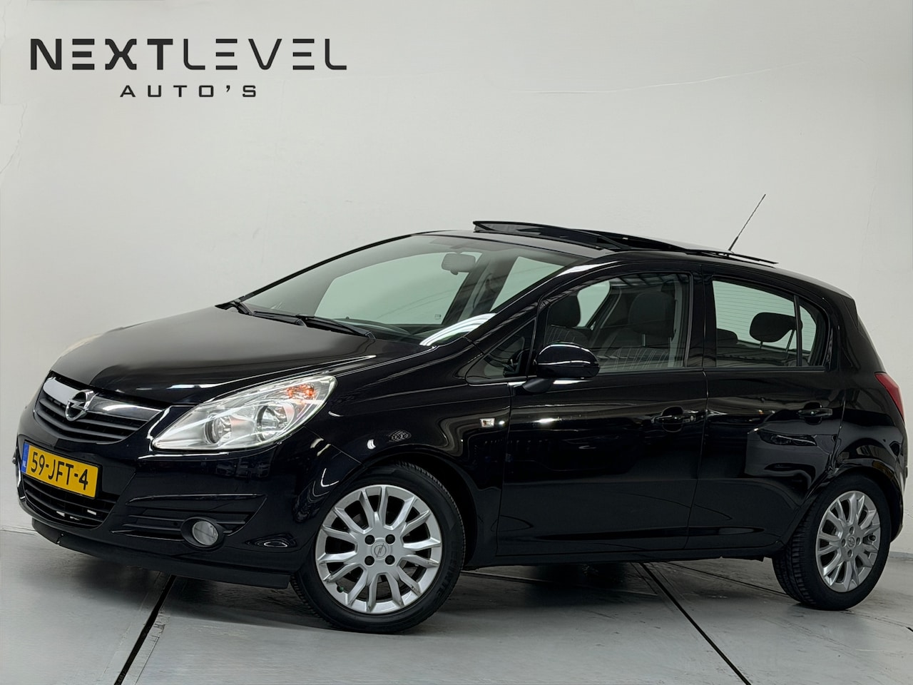 Opel Corsa - 1.4-16V Edition Vol Automaat Panodak Cruise - AutoWereld.nl