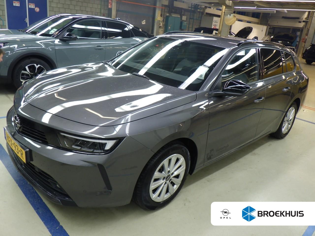 Opel Astra Sports Tourer - 1.2 Turbo Business Edition / Navigatie / PDC V+A / Stuur -en Stoelverwarmd / Keyless / Car - AutoWereld.nl