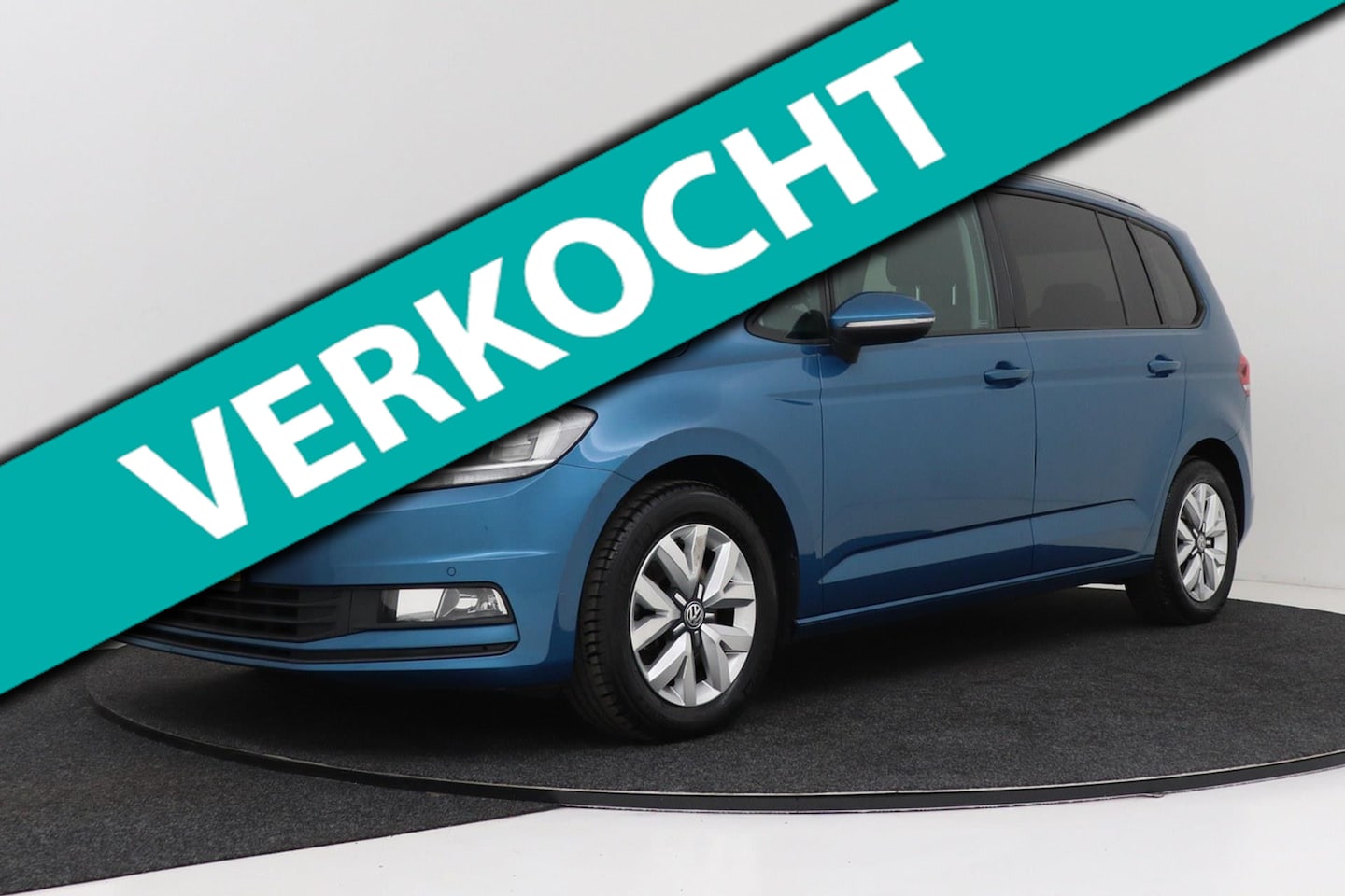 Volkswagen Touran - 1.2 TSI Comfortline Business 7p | Trekhaak | 3-zone clima | Adap Cruise | Camera - AutoWereld.nl