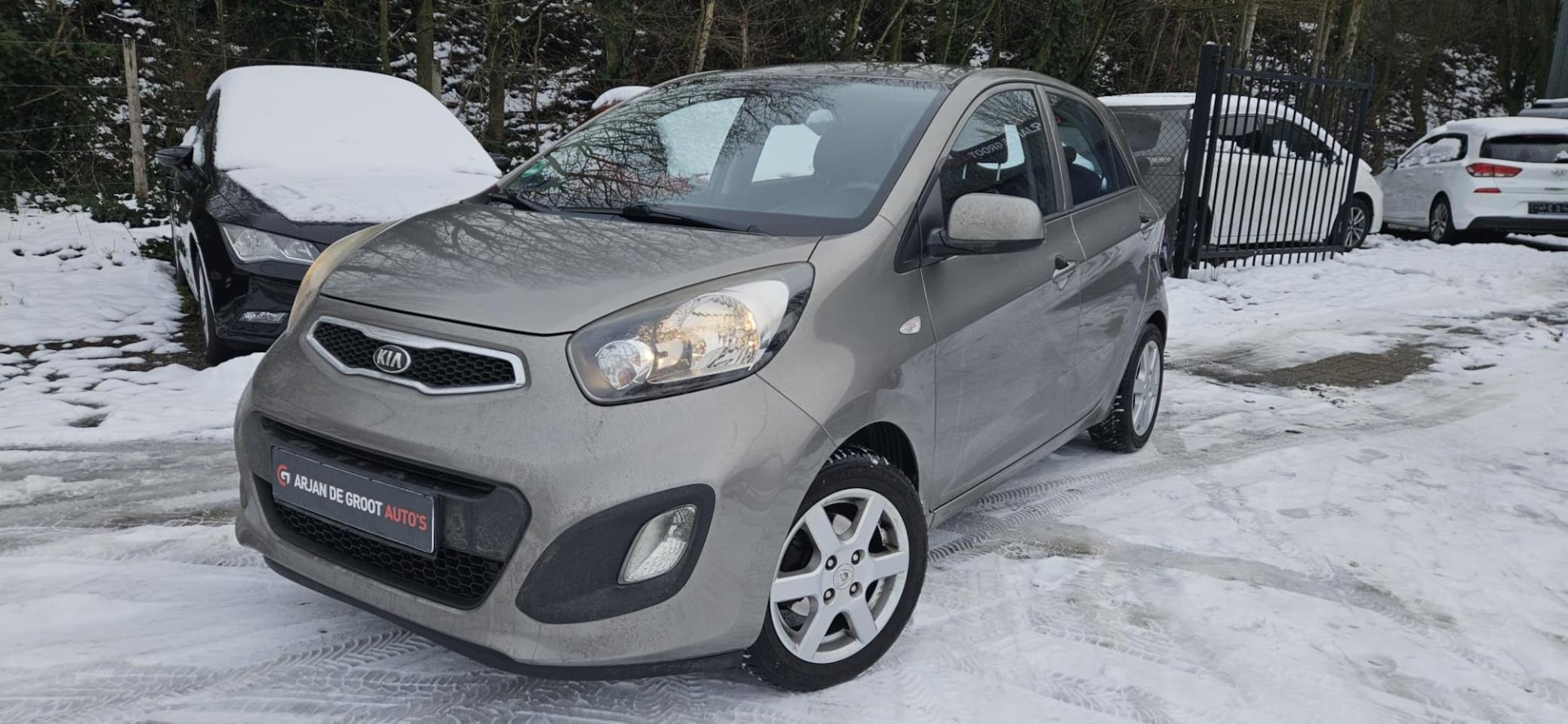 Kia Picanto - 1.2 86PK 5Drs AUTOMAAT Airco Elec pakket All season banden - AutoWereld.nl