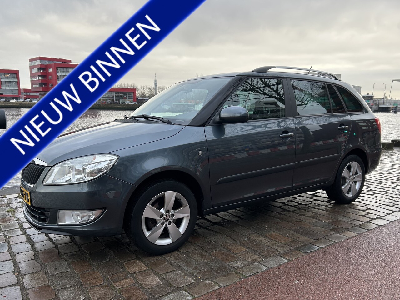 Skoda Fabia Combi - 1.2 TSI Drive navigatie airco/ecc nieuwstaat - AutoWereld.nl