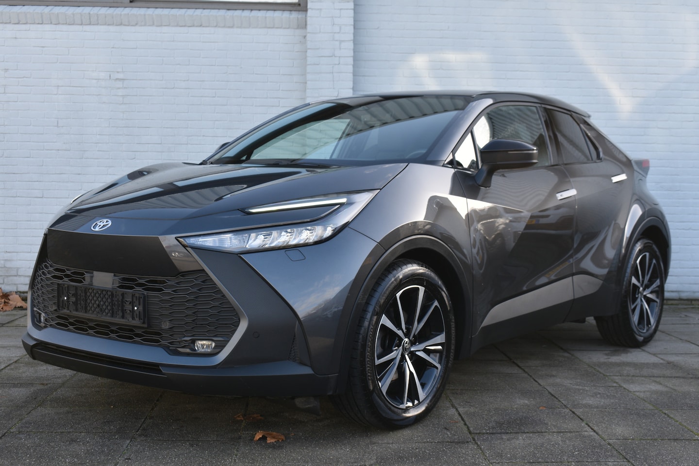 Toyota C-HR - 1.8 Hybrid 140 Dynamic Limited Automaat 140pk | BSM | PDC | Achteruitrijcamera | Keyless e - AutoWereld.nl