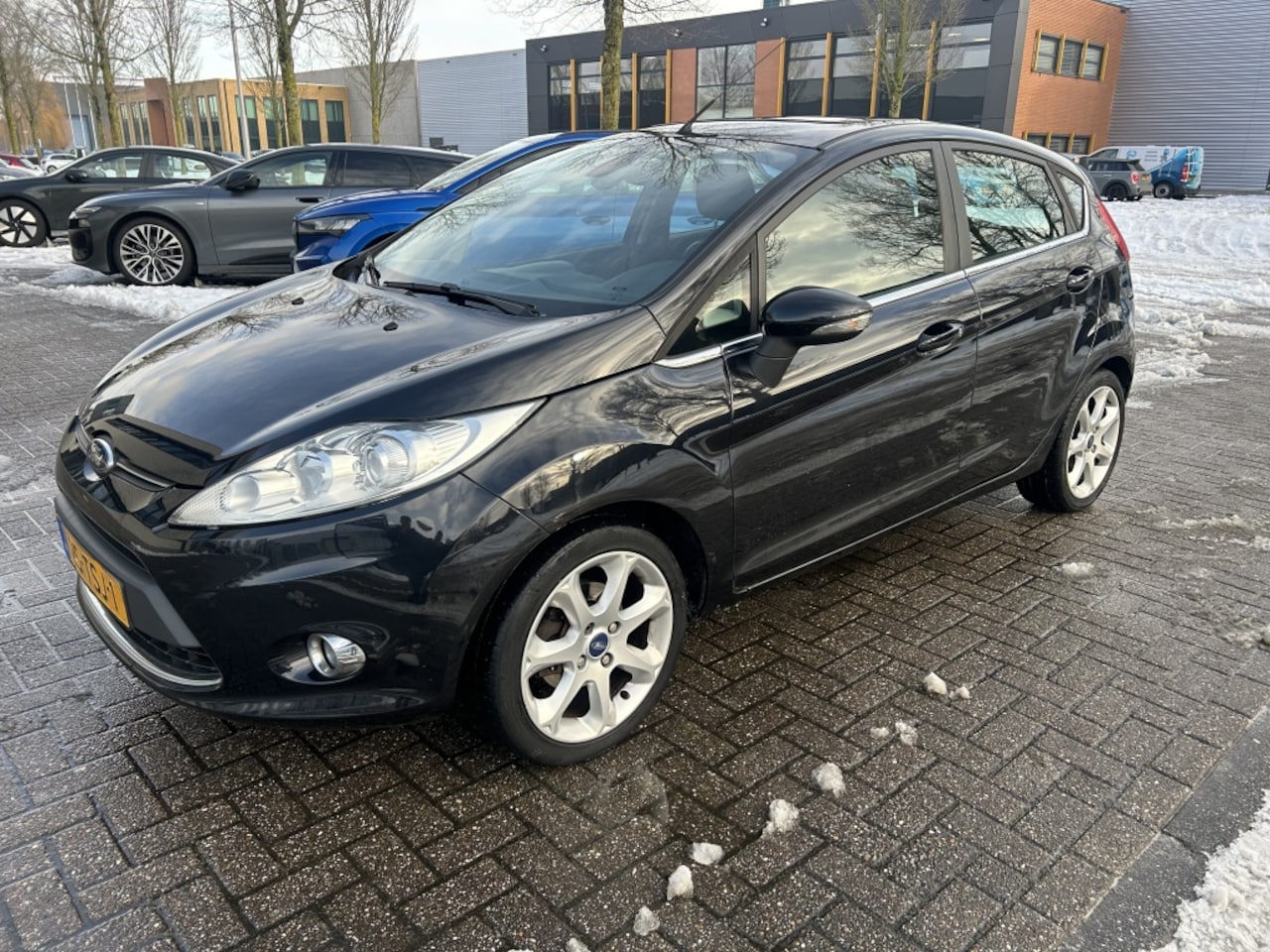 Ford Fiesta - 1.25 Titanium SCHUIFDAK CLIMA CRUISE NAP! - AutoWereld.nl