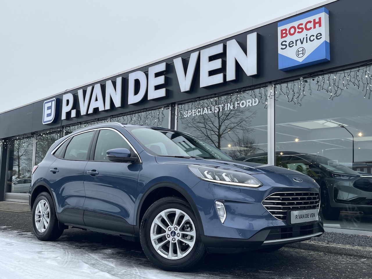 Ford Kuga - 2.5 PHEV Titanium 225pk/165kW e-CVT Automaat | Koplampsproeiers | 81562 | Winter Pack | - AutoWereld.nl