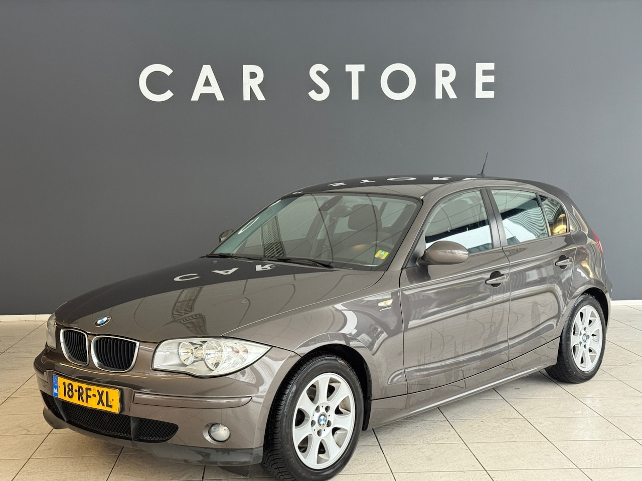 BMW 1-serie - 118i 130PK High Executive AUT ORG NL Auto - AutoWereld.nl