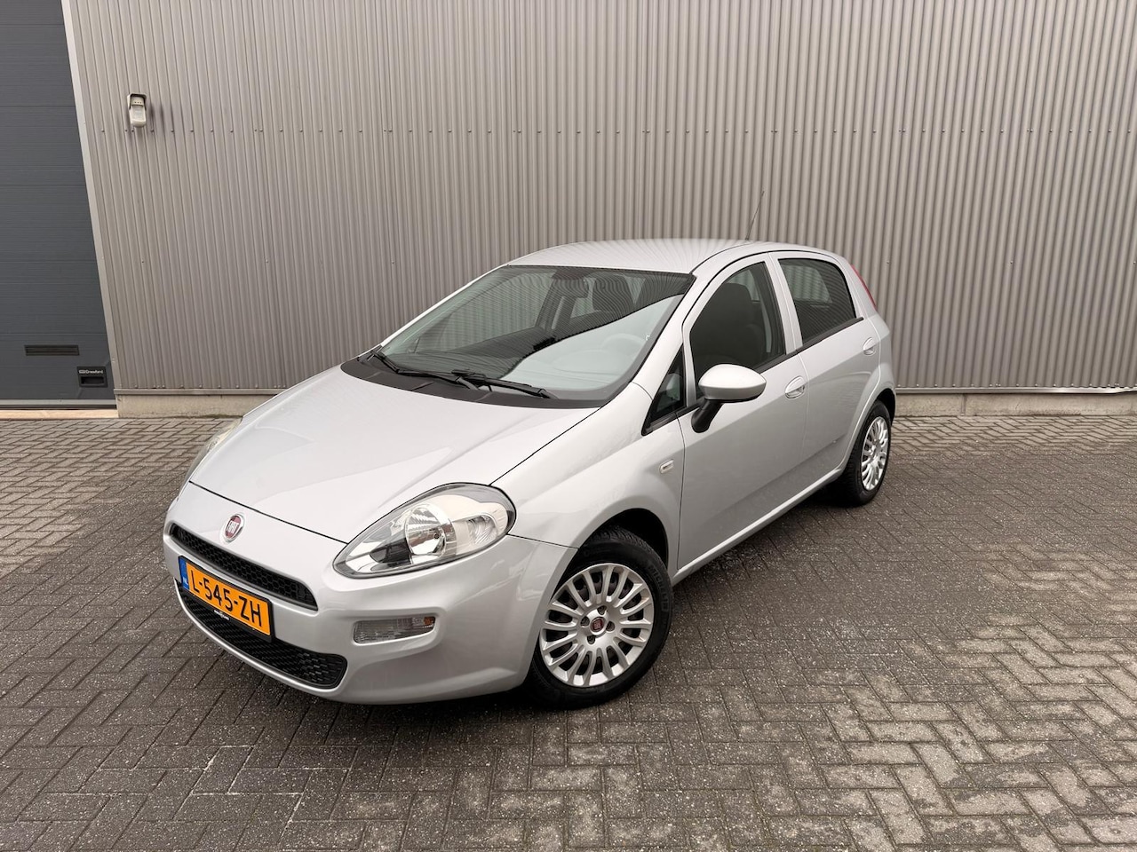 Fiat Punto Evo - 1.2 Lounge Nieuwe koppeling|Elektrische ramen|Airco - AutoWereld.nl
