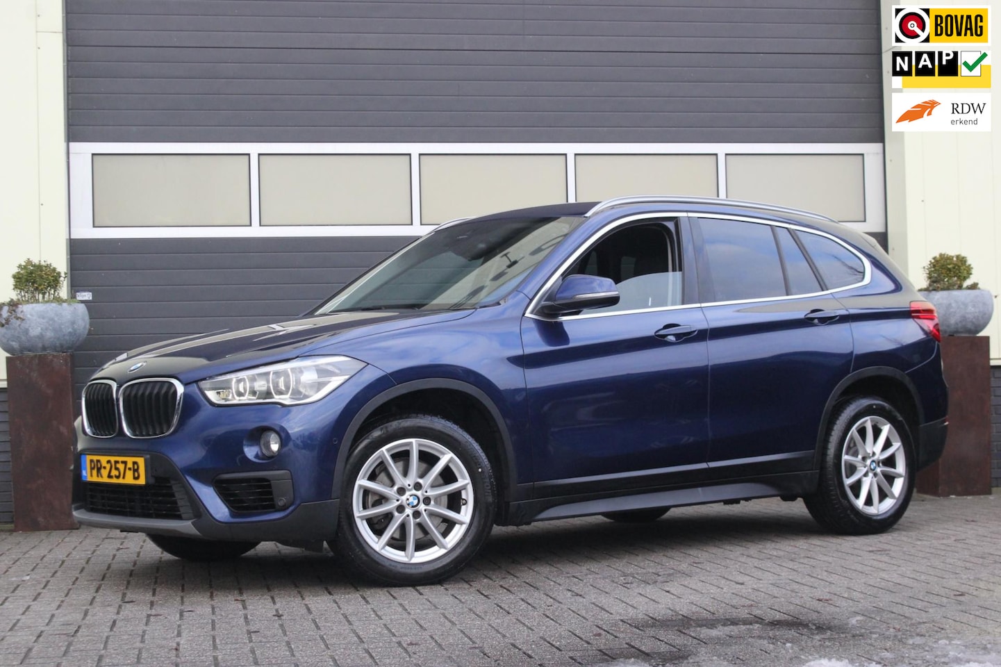 BMW X1 - SDrive18i High Executive Leer HUD - AutoWereld.nl