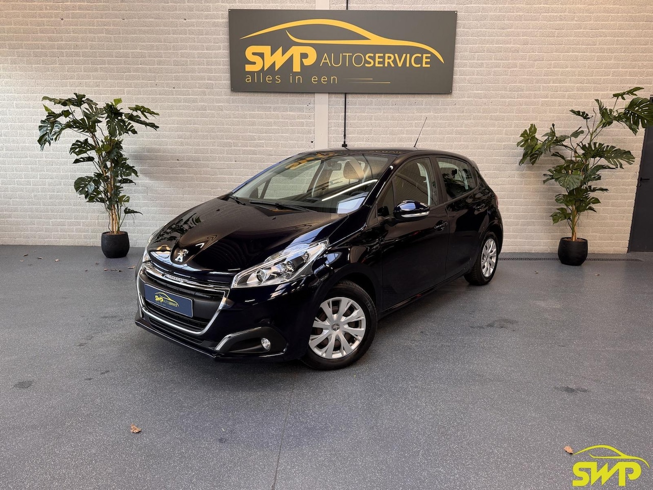 Peugeot 208 - 1.2 PureTech Blue Lion | Navi | PDC | NAP | Onderhoud goed - AutoWereld.nl