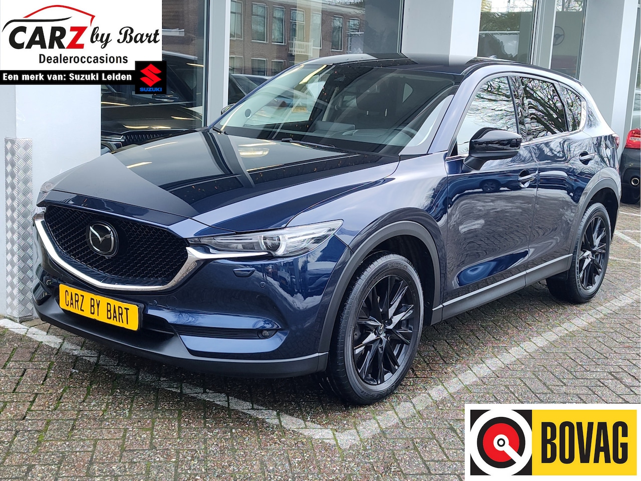 Mazda CX-5 - 2.0 SKYACTIV-G 165 HOMURA Bose | Stuurverwarming | 360 Camera - AutoWereld.nl