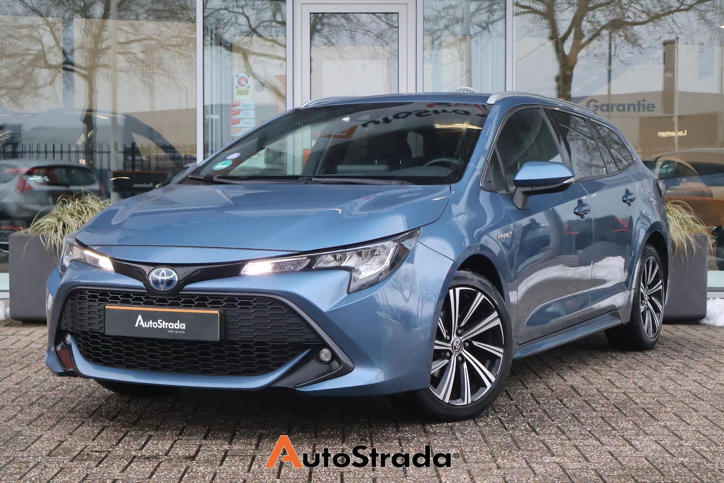 Toyota Corolla Touring Sports - 1.8 Business Plus 122pk | Keyless | Camera | LED | Stoelverwarming | ACC | Climate - AutoWereld.nl