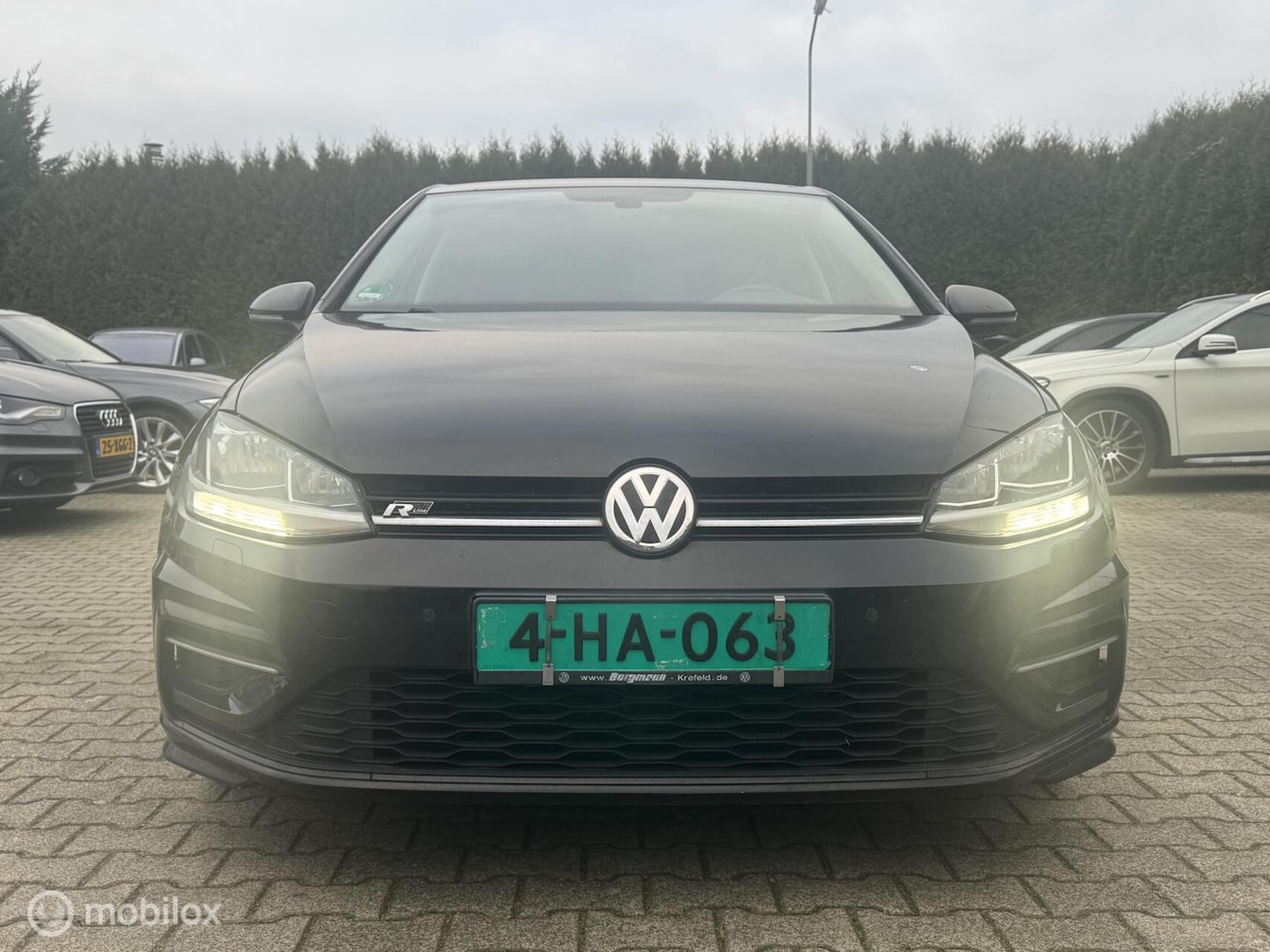 Volkswagen Golf - 1.6 tdi R Line Airco|Navi|Pdc|Export prijs - AutoWereld.nl