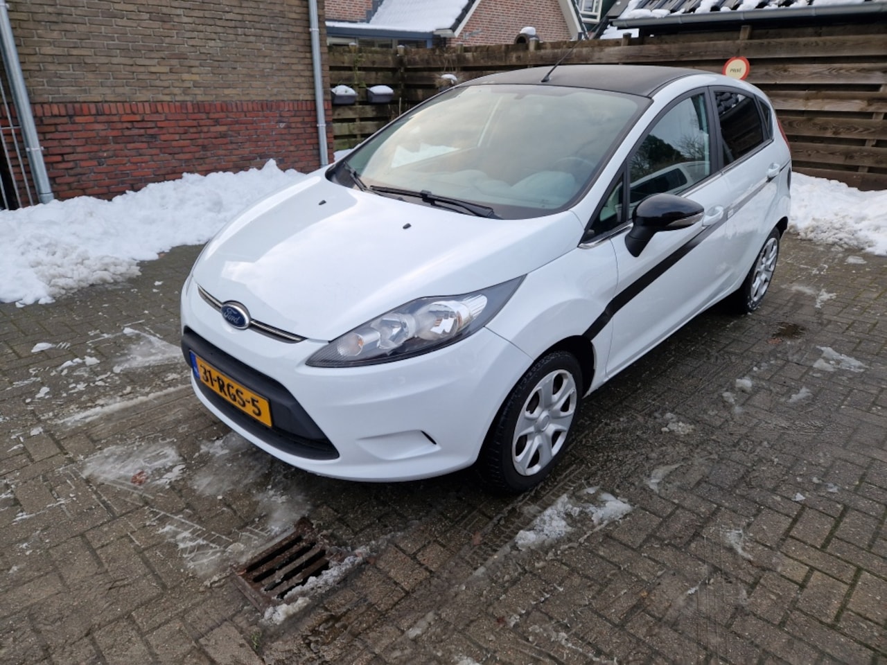 Ford Fiesta - 1.25 Limited Black & White 121DKM N.a.p.! - AutoWereld.nl