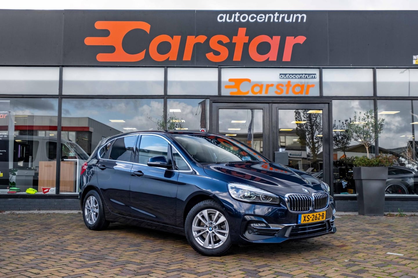 BMW 2-serie Active Tourer - 218i Corporate Lease High Executive|Navi|Pdc|Cruise - AutoWereld.nl