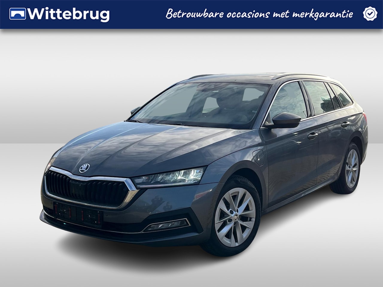 Skoda Octavia Combi - 1.4 TSI iV 204pk PHEV Style DSG Automaat / Panorama dak / Navigatie by APP / LM 17 inch / - AutoWereld.nl