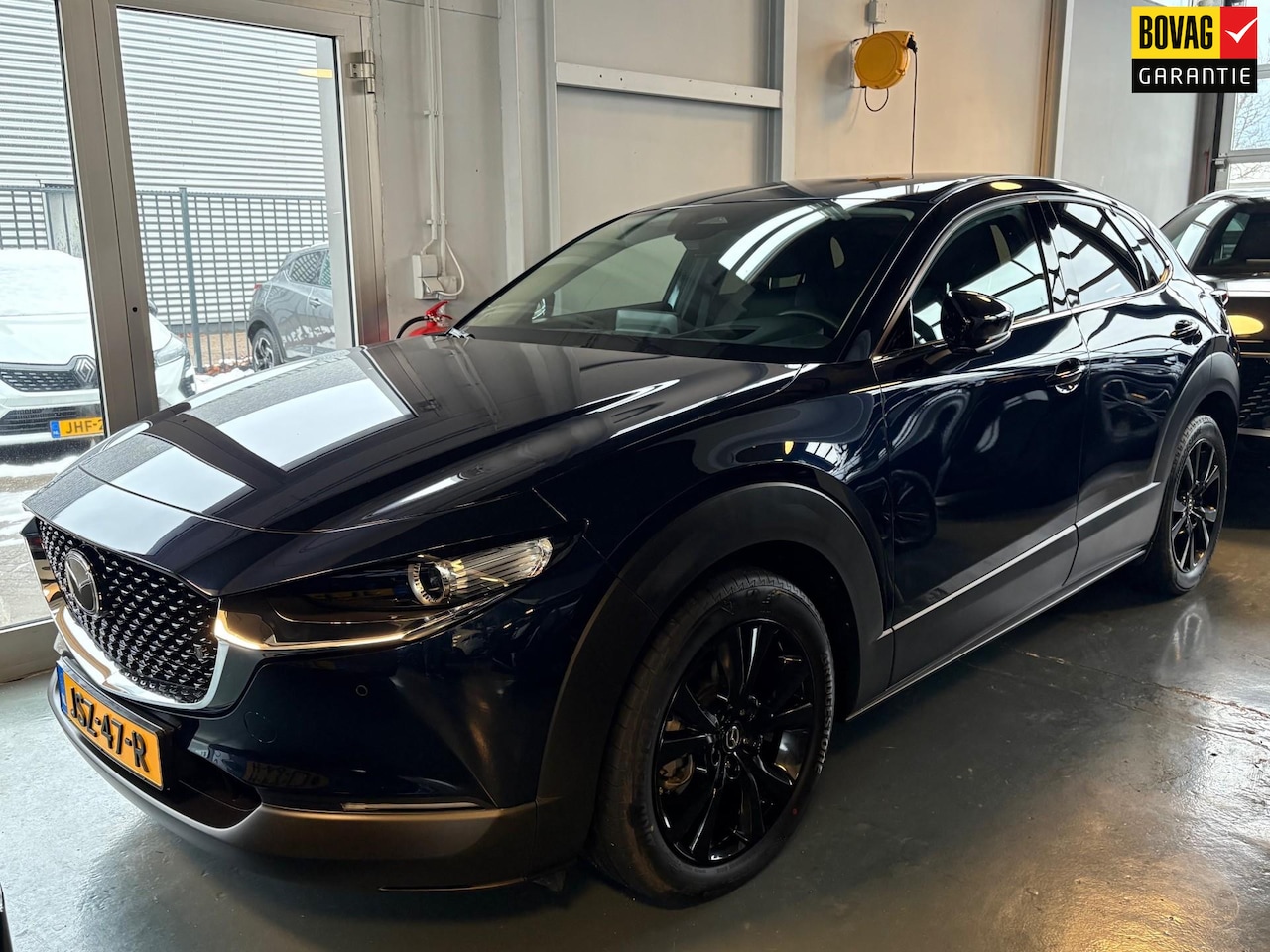 Mazda CX-30 - 2.5 e-SkyActiv-G M Hybrid Homura Headup Camera - AutoWereld.nl