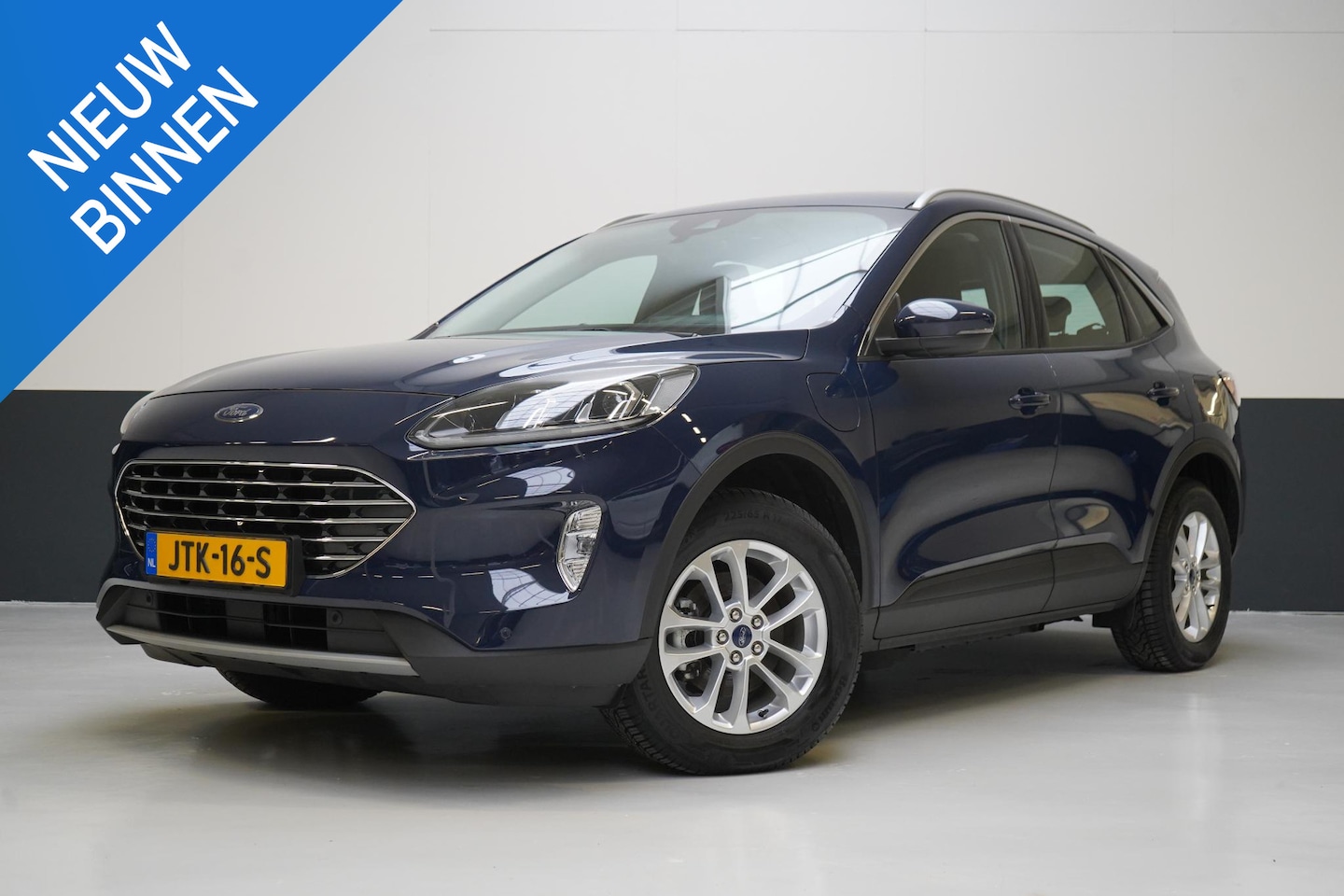 Ford Kuga - 2.5 PHEV Titanium | Head-Up | Stoelverwarming | Navigatie | Achteruitrijcamera | Stuurverw - AutoWereld.nl