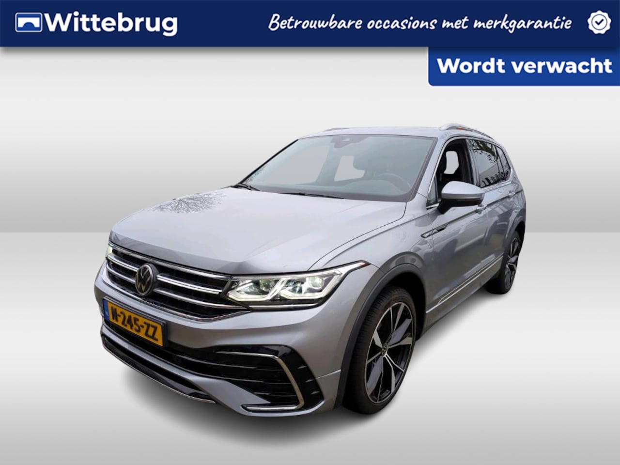 Volkswagen Tiguan Allspace - 1.5 TSI R-Line Business+ 7 persoons DSG Automaat Winterpakket / El. achterklep / Panoramad - AutoWereld.nl