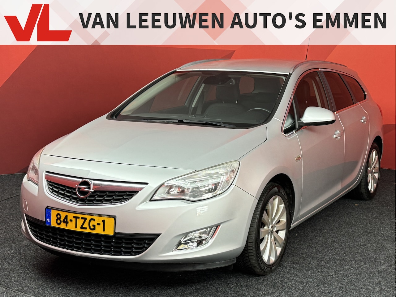 Opel Astra Sports Tourer - 1.4 Turbo Cosmo | Trekhaak | Cruise | Half leder - AutoWereld.nl