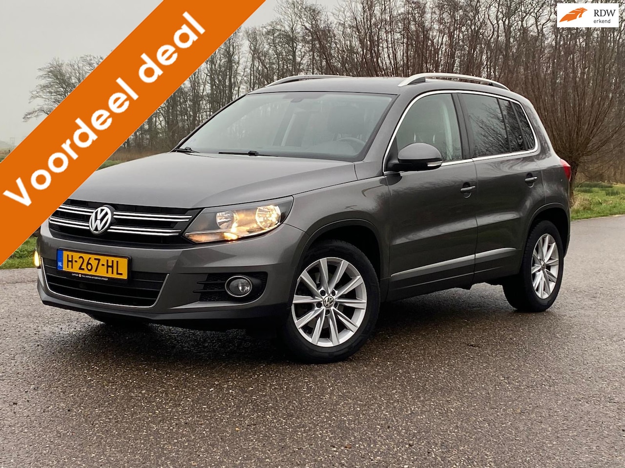 Volkswagen Tiguan - 1.4 TSI Highline 5DRS NAVI CAMERA AIRCO NAP GOED ONDERHOUDEN - AutoWereld.nl