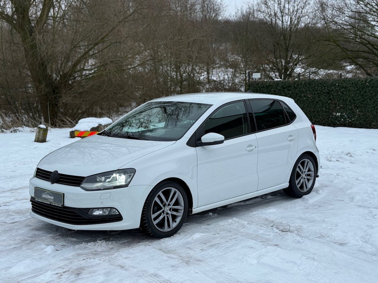 Volkswagen Polo - 1.2 TSI Highline R-LINE I LEER I PDC I NAVI I NETTE AUTO - AutoWereld.nl