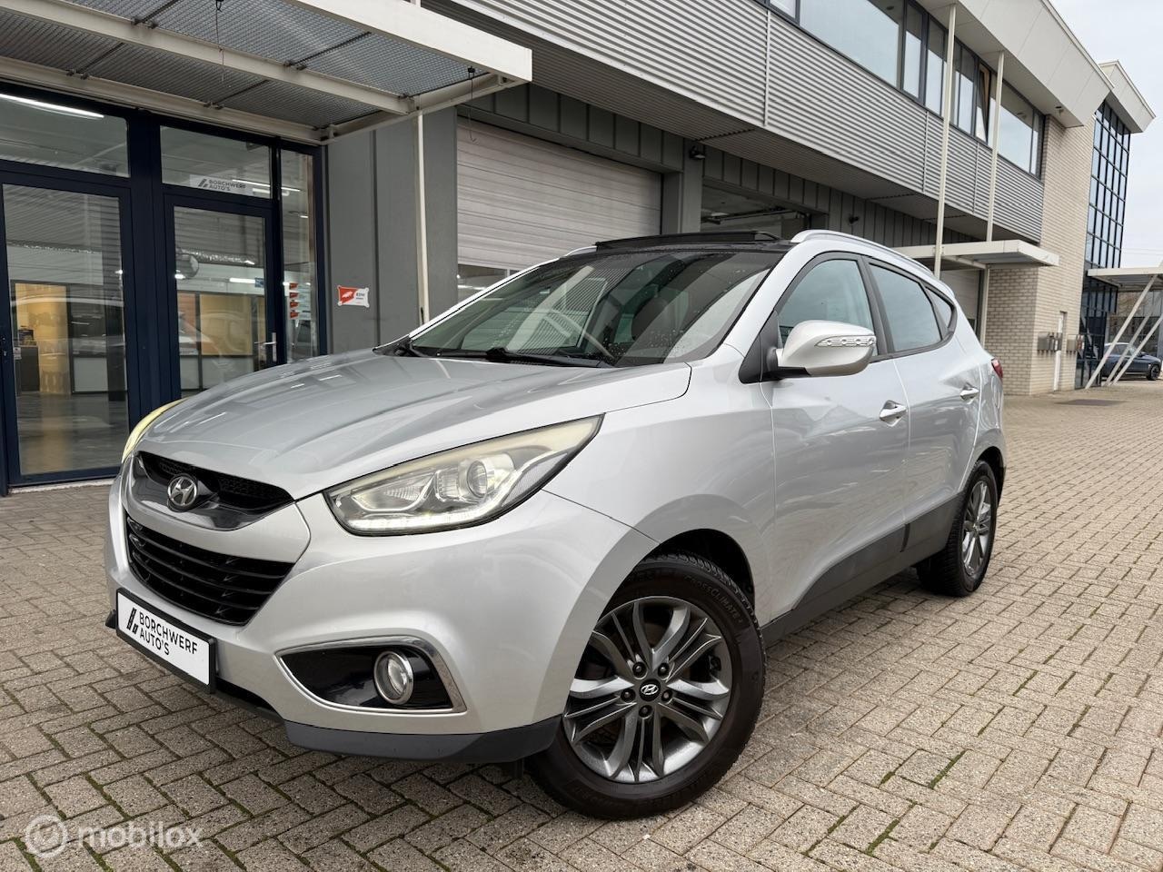 Hyundai ix35 - 1.6 Benzine | Pano | Navigatie | Hoge instap - AutoWereld.nl