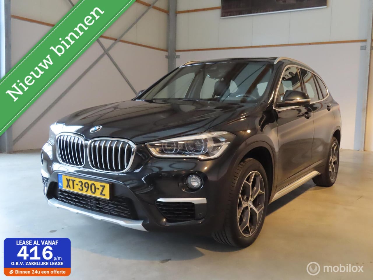 BMW X1 - sDrive20i Orange Edition III|Panoramadak|Leder|Camera|el achterklep|Stoelverwarming. - AutoWereld.nl