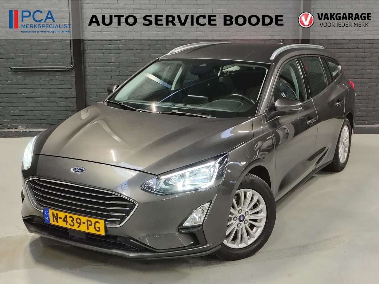 Ford Focus Wagon - 1.0 (125 pk) Titanium Business - trekhaak - keyless - navigatie - AutoWereld.nl