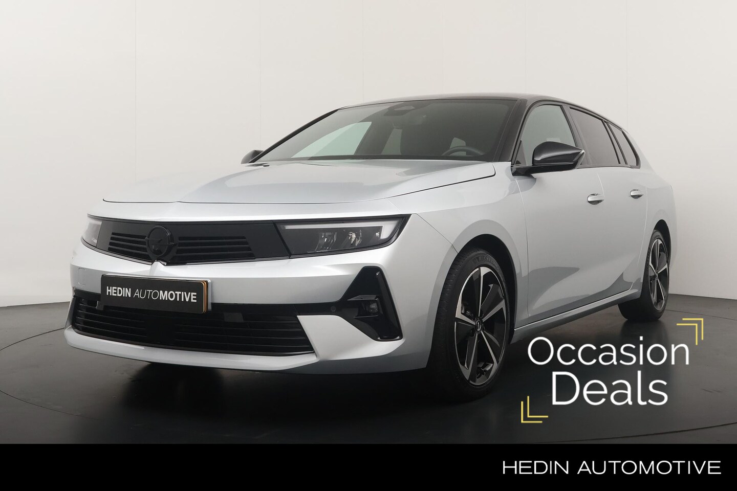 Opel Astra Sports Tourer - 1.2 145pk Hybrid GS | Navigatie | Adaptive Cruise Control | Stuur/Stoelverwarming | Camera - AutoWereld.nl