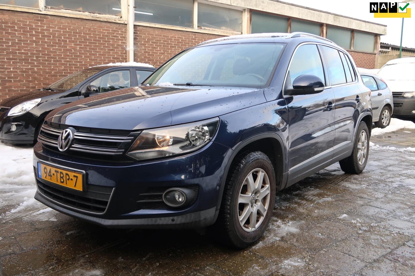 Volkswagen Tiguan - 1.4 TSI Sport&Style - AutoWereld.nl