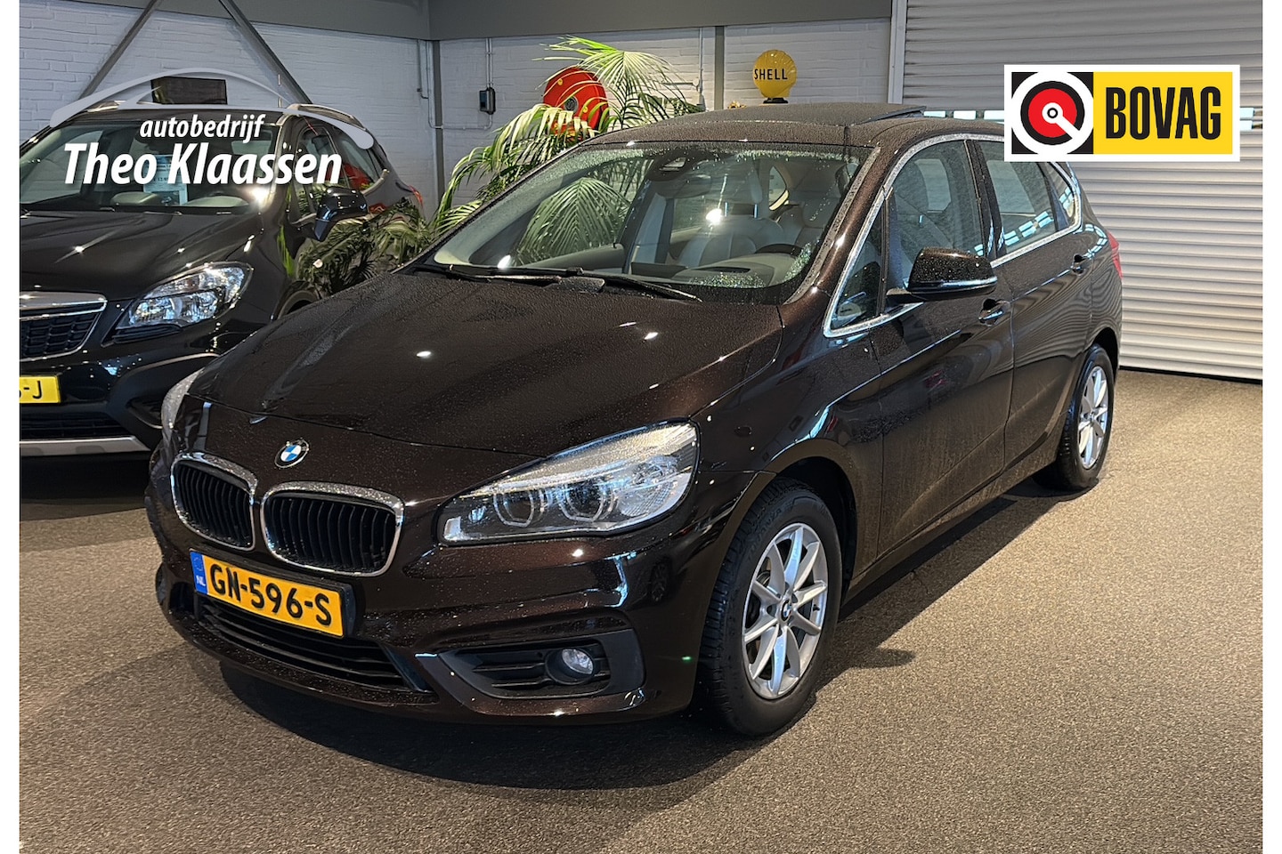 BMW 2-serie Active Tourer - 218i Essential Pano Head-up Leder Navi 1e eigenaar 78.000km NAP - AutoWereld.nl