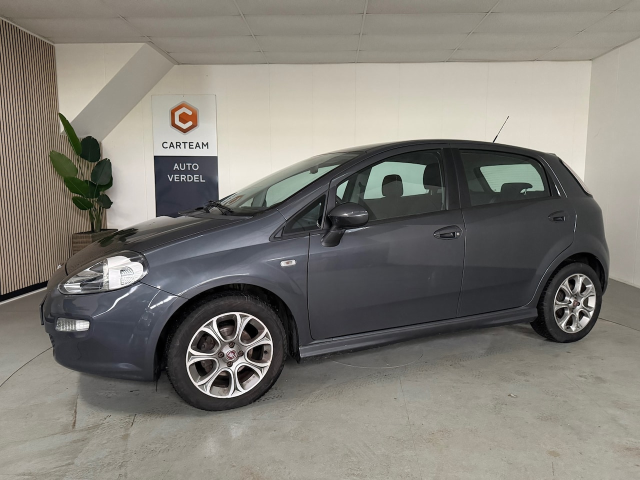 Fiat Punto Evo - 0.9 TwinAir Street Airco. LMV - AutoWereld.nl