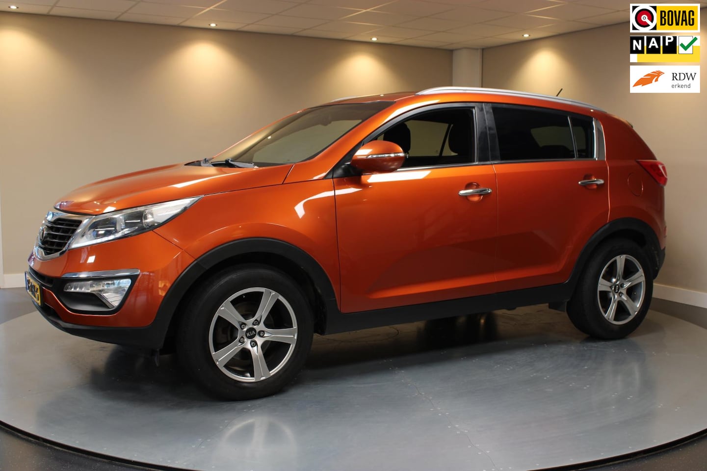 Kia Sportage - 1.6 GDI Plus Pack *2de Eigenaar!* Trekhaak|Climate|Cruise|NAP - AutoWereld.nl