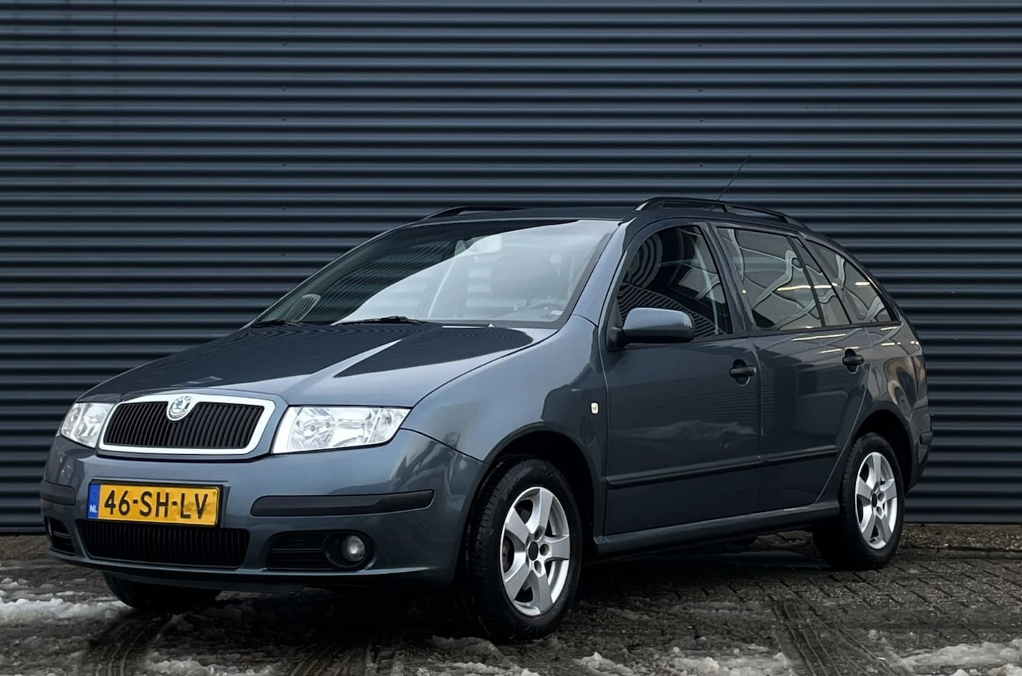 Skoda Fabia Combi - 1.4 AUT 1ste eigenaar! + Dealer onderhouden - AutoWereld.nl