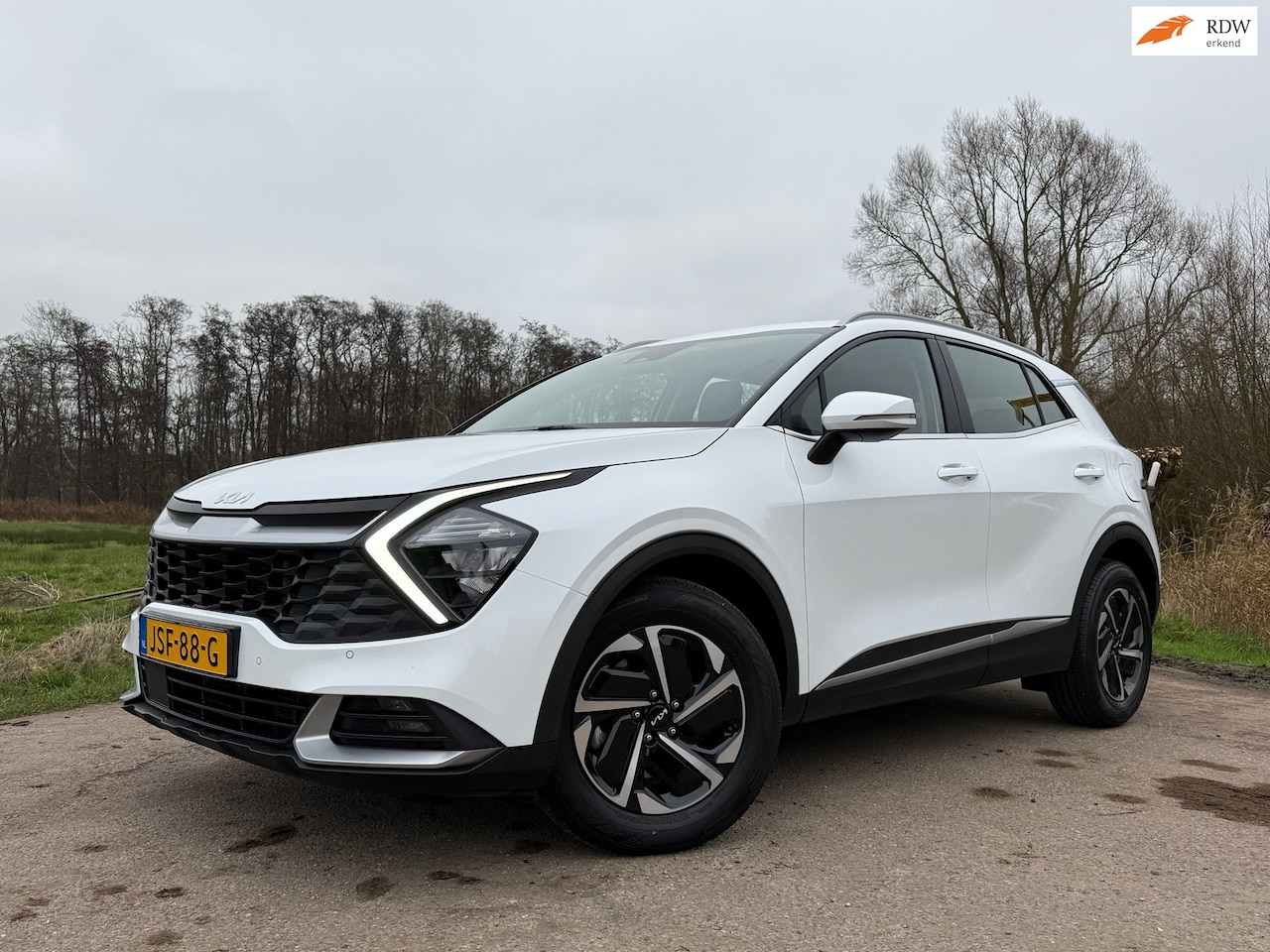 Kia Sportage - 1.6 T-GDi Hybrid DynamicLine / Automaat / BTW Auto / Camera / Apple CarPlay-Android Auto / - AutoWereld.nl