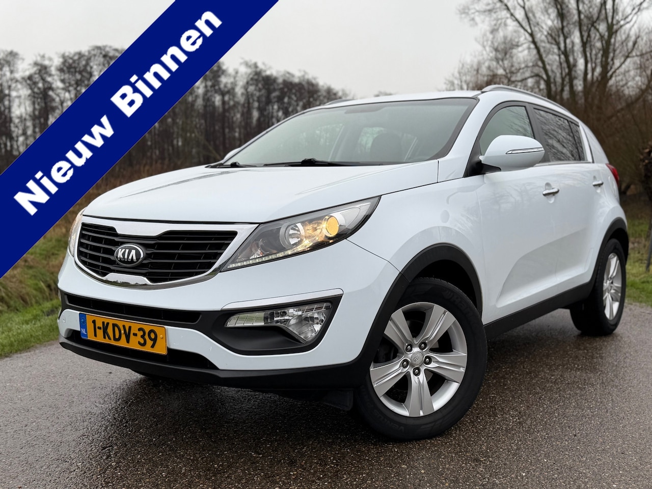 Kia Sportage - 1.6 GDI Plus Pack / Camera / Navi / Clima / 17" Velgen / PDC / Cruise / LED / - AutoWereld.nl