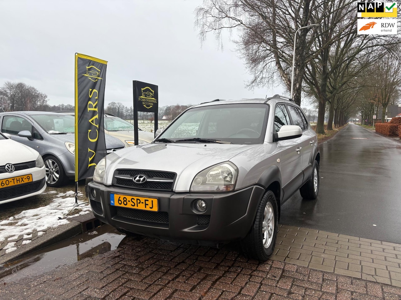 Hyundai Tucson - 2.0i Dynamic 2.0i Dynamic,AIRCO,CRUISE,DAKRAILS,MISTLAMPEN VOOR,SPORTVELGEN,TREKHAAK - AutoWereld.nl