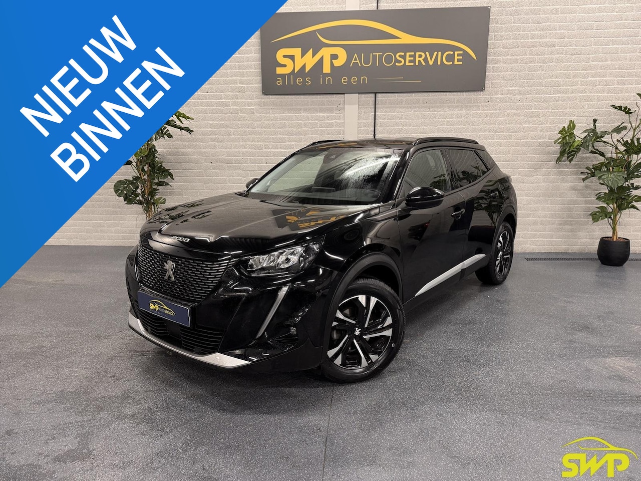 Peugeot 2008 - 1.2 PureTech Allure Pack | Navi | Cam | 3D cockpit - AutoWereld.nl