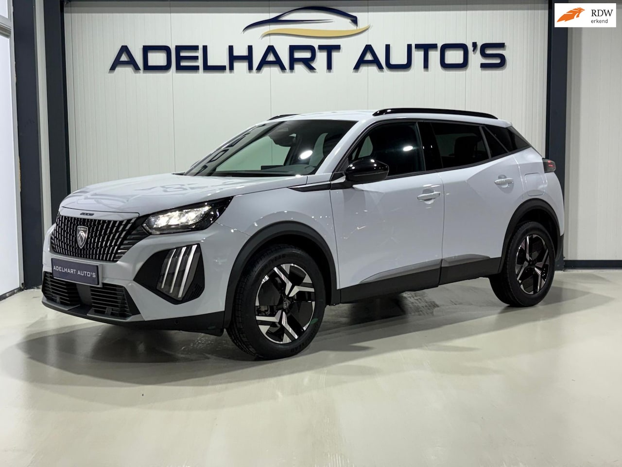 Peugeot 2008 - 1.2 Hybrid 145 Allure Automaat / Navigatie full map / Keyless / Cruise control / etc.. - AutoWereld.nl