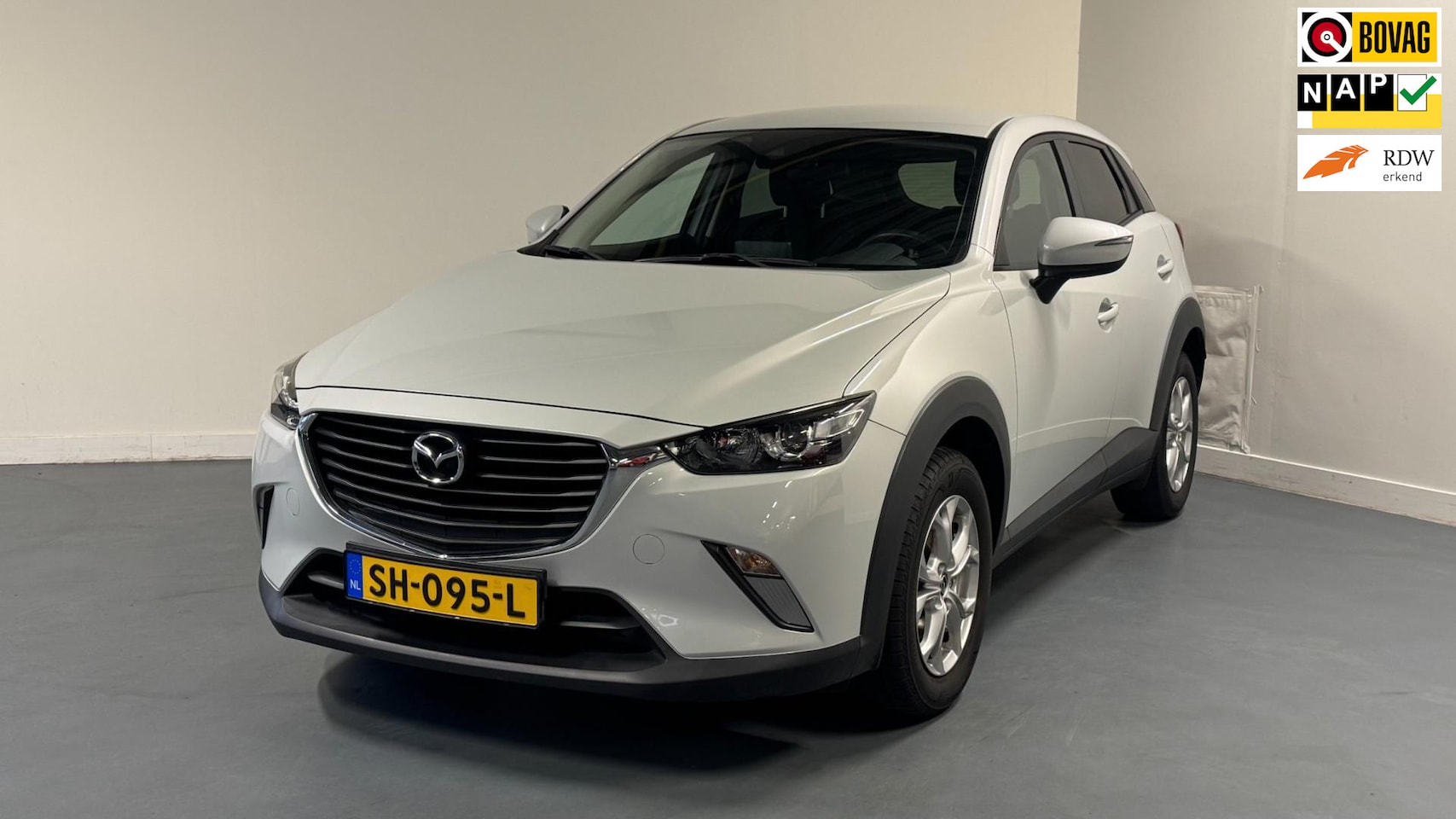 Mazda CX-3 - 2.0 SkyActiv-G 120 Dynamic | NL-AUTO | DEALER OND. | NAVI + CARPLAY | PARKEERSENS. | - AutoWereld.nl