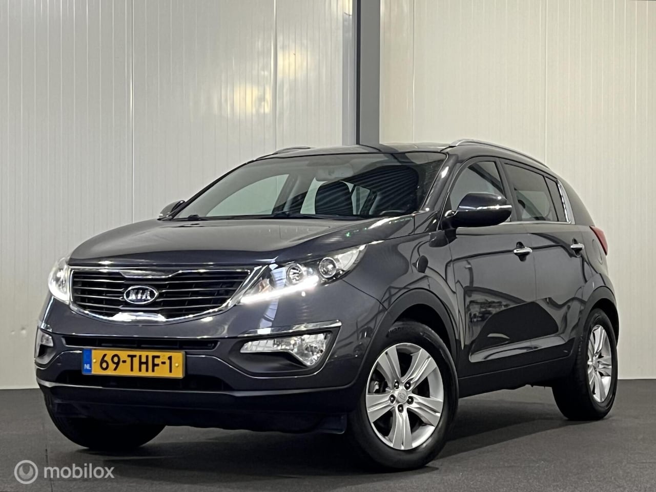 Kia Sportage - 1.6 GDI ISG X-ecutive Plus Pack [ NAP trekhaak half-leder ] - AutoWereld.nl